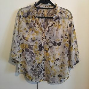 Ruffle neck Pleione blouse