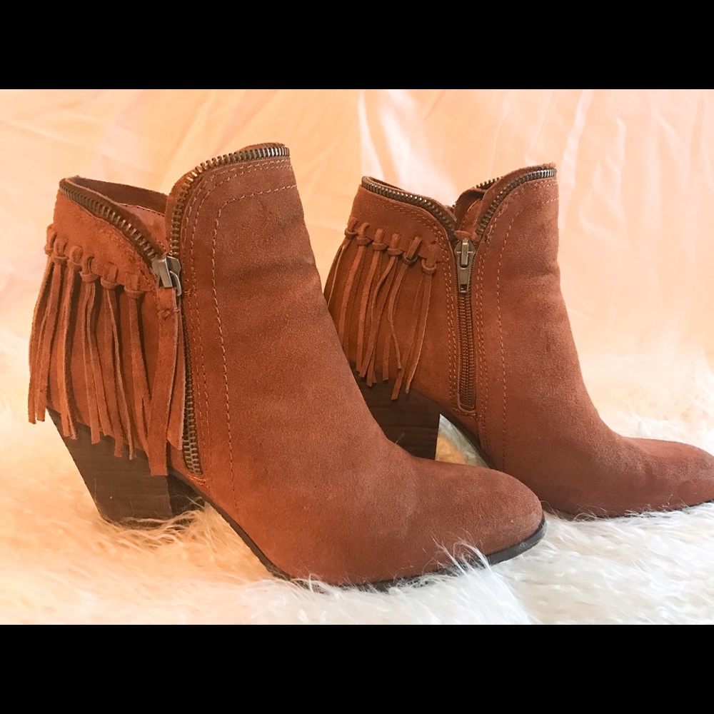 Dolce Vita cognac tassel booties.