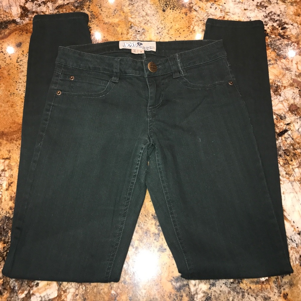 Dark, dark green skinny jeans
