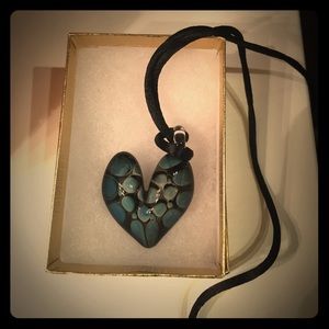 Heart shaped glass pendant with black cord
