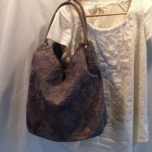 Slate gray embroidered cotton bag.