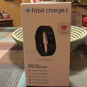 Fitbit charge 2 with 11 colored bands.