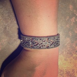 Statement earrings paired with braclet