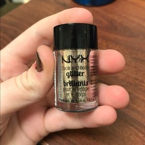 NYX gold face and body glitter