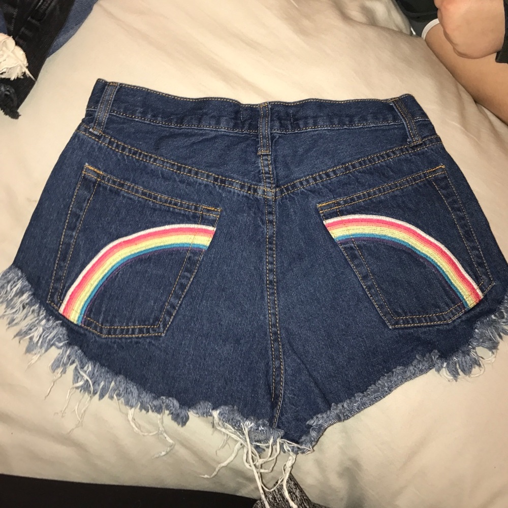 Denim shorts w rainbow on butt cheeks 🌈