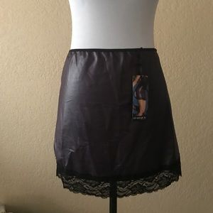 Purple skirt with black lace trim.