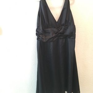 Satin black dress.