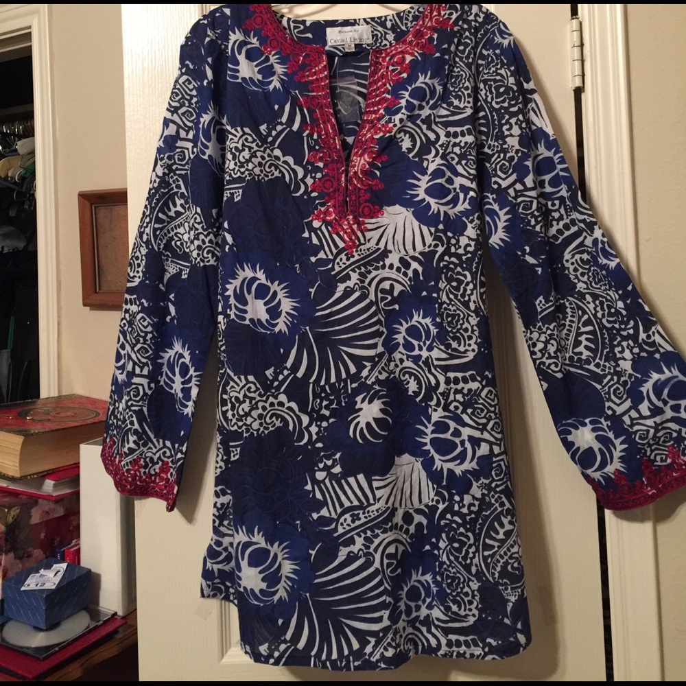 Casual Living blue & white tunic with red trim.