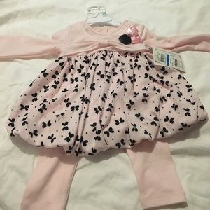 Pink bubble dress with matching leggings.