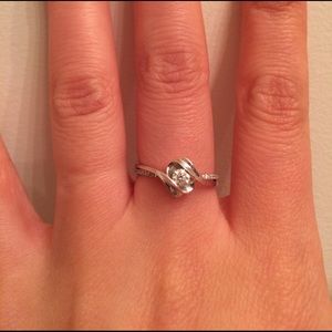 Platinum ring with a 0.15 carat diamond in center