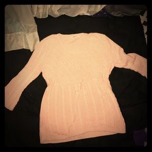 Cato's pink sweater.