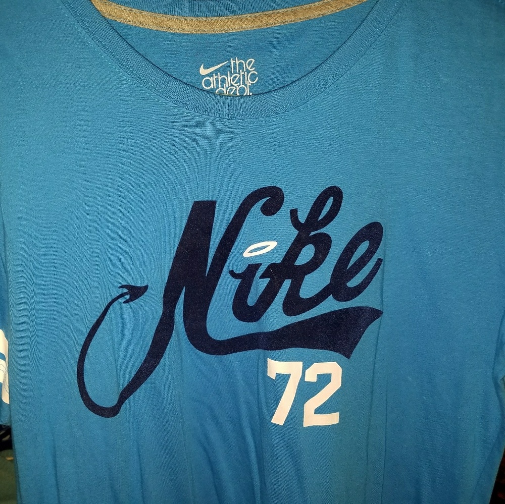 Nike activewear shirt blue with Nike logo and