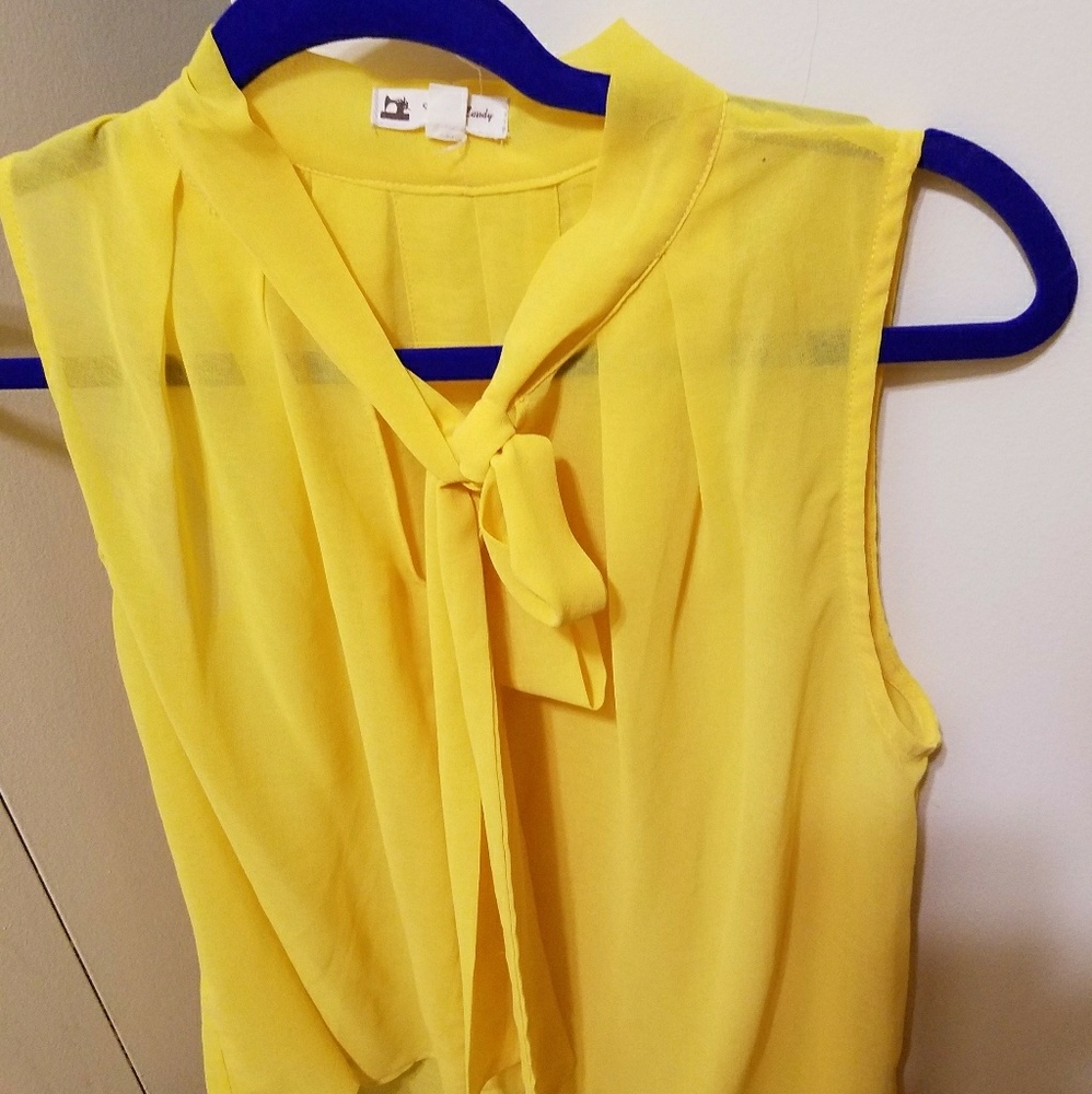 Beautiful yellow no sleeves blouse