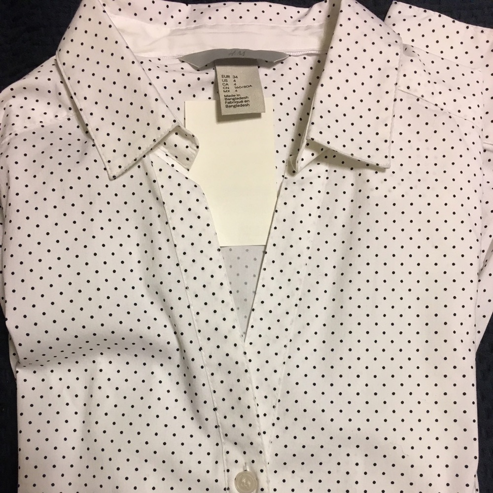 White polka dot button up blouse