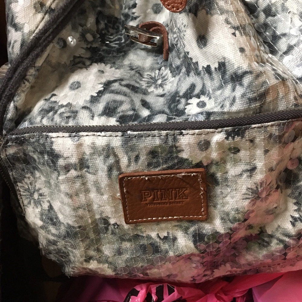 PINK sequined daisy backpack.
