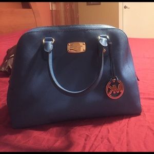 Leather tote bag. Michael Kors