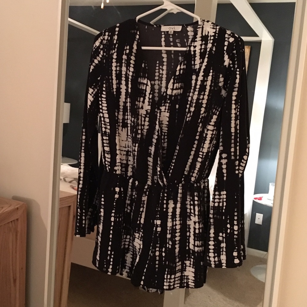 OVI. Silk black and white long sleeve romper.