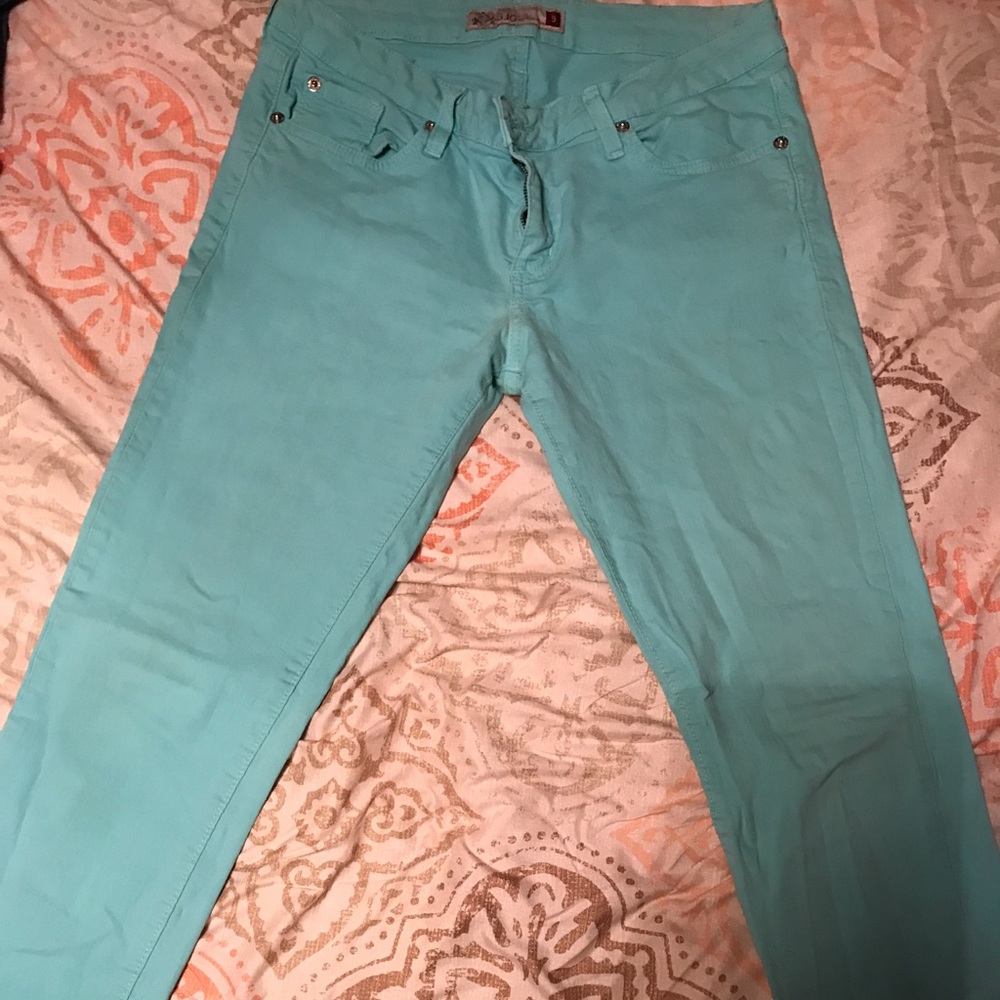 Turquoise skinny jeans