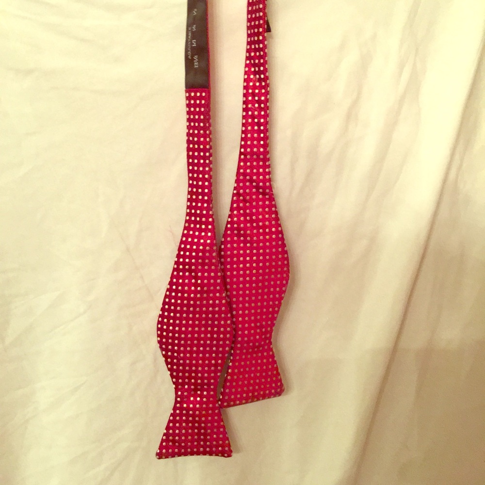 Red bow tie with white dots