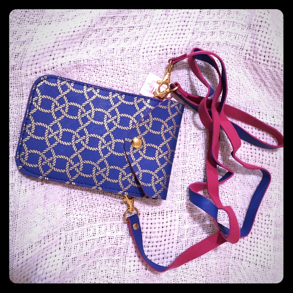 Wristlet or cross body- new with tags- boutique-