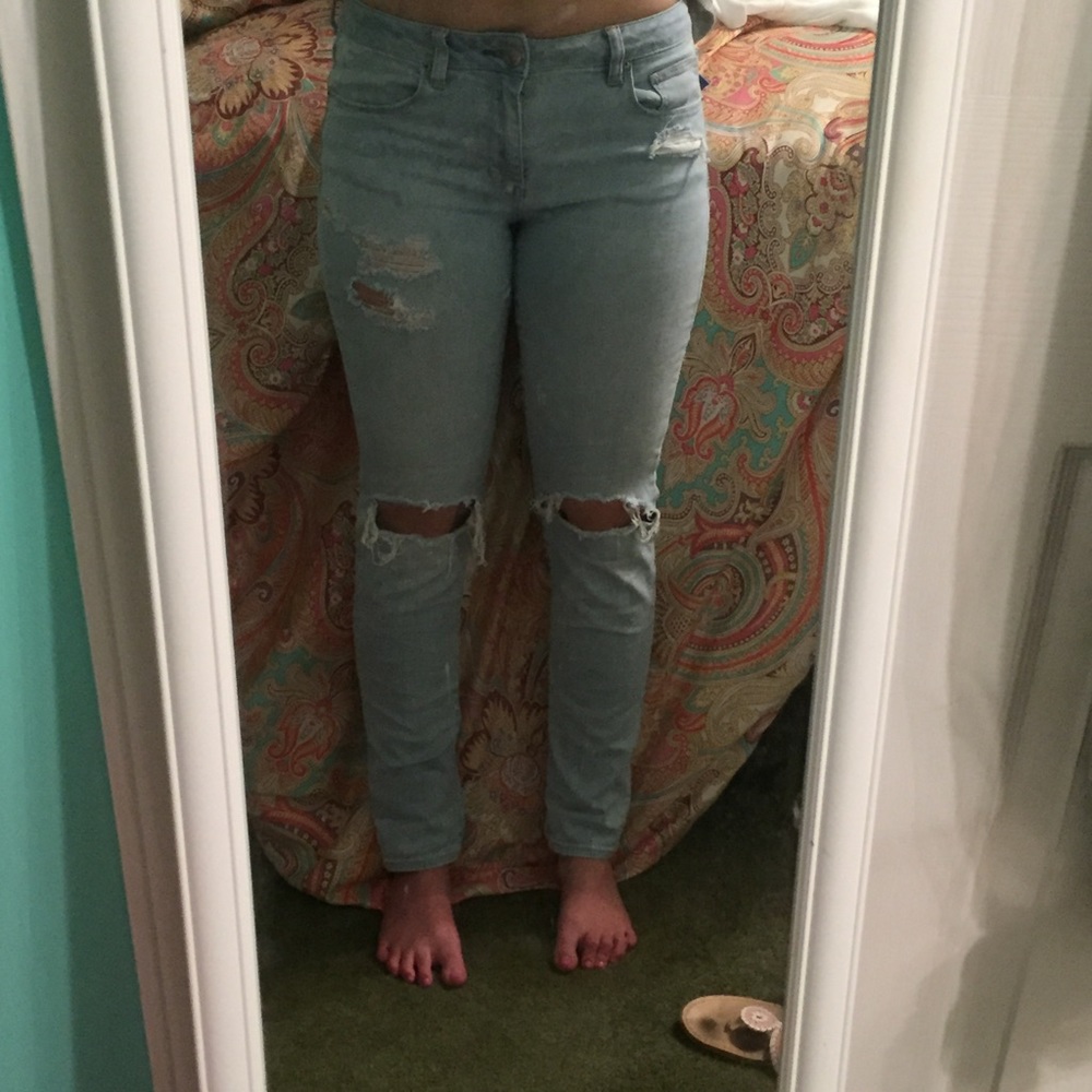 Super stretch light wash jeans with holes