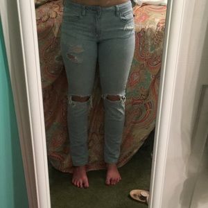 Super stretch light wash jeans with holes