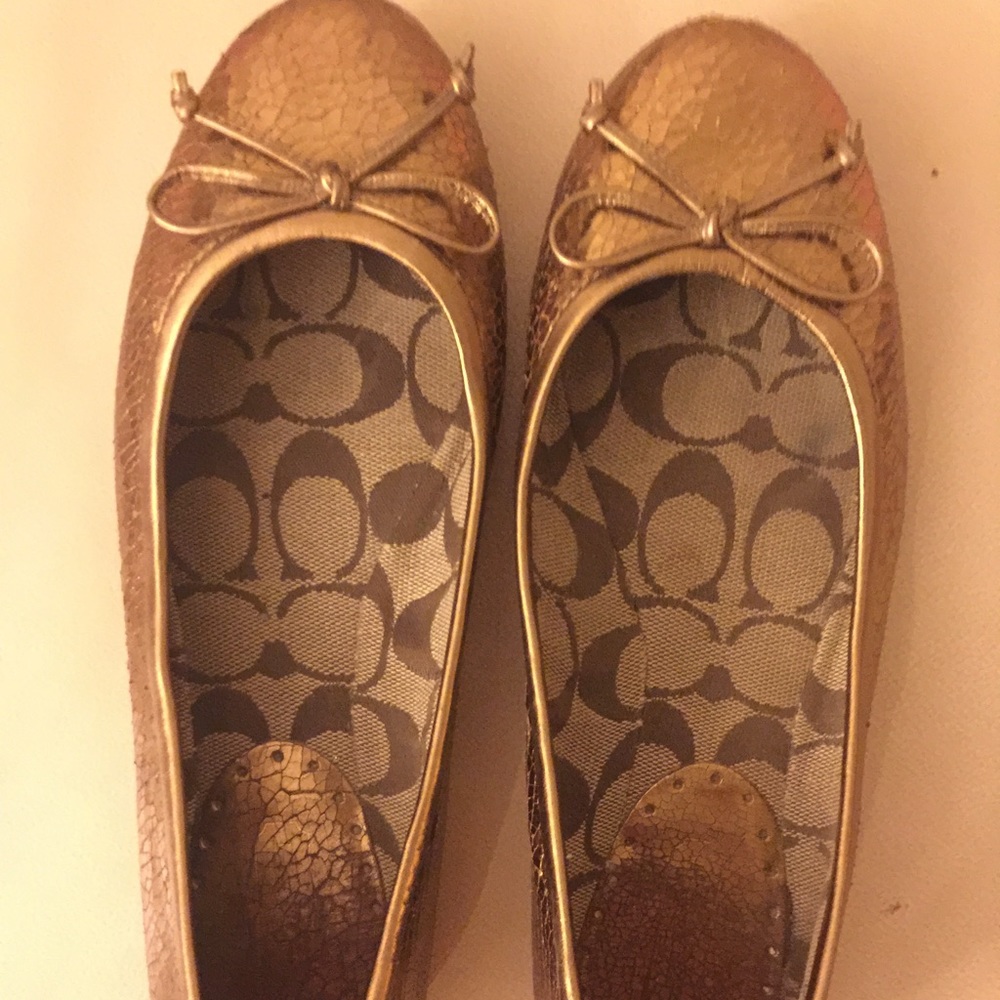 Coach gold flats. Used. Size 7.5