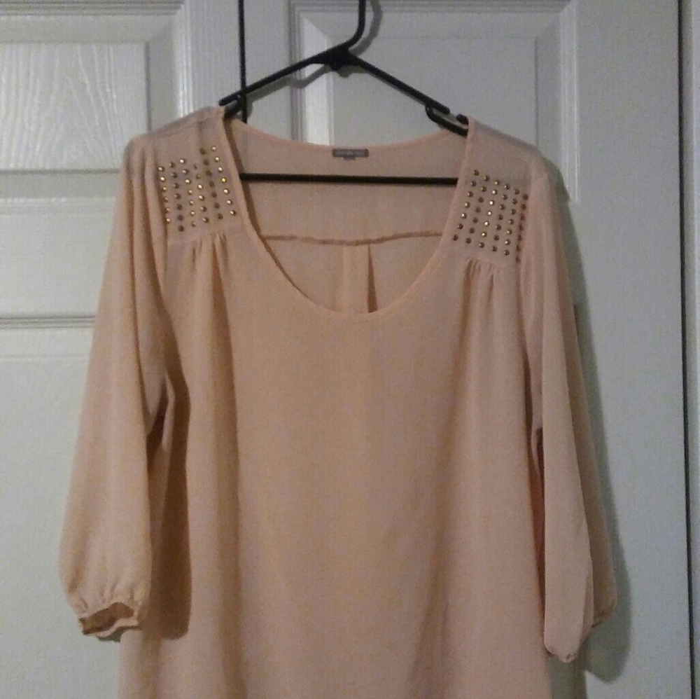 Very cute sheer blouse with detail on shoulder