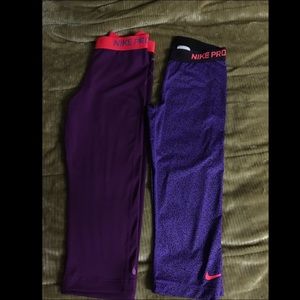 2 pairs of Nike Pros