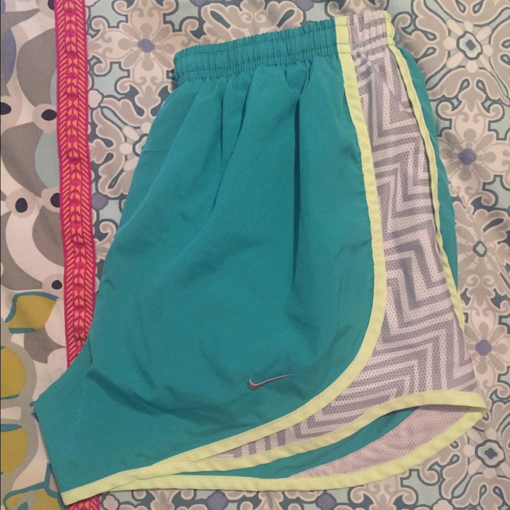 Teal Nike running shorts