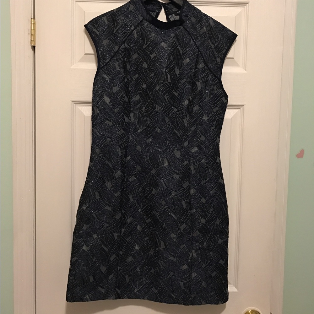 Mock neck bodycon dress with cutout back