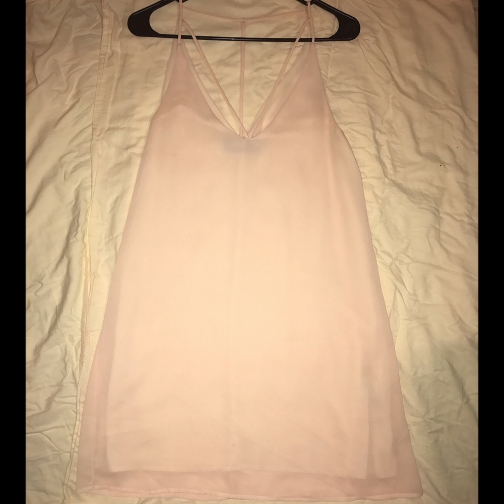 Nude dress with detailed straps