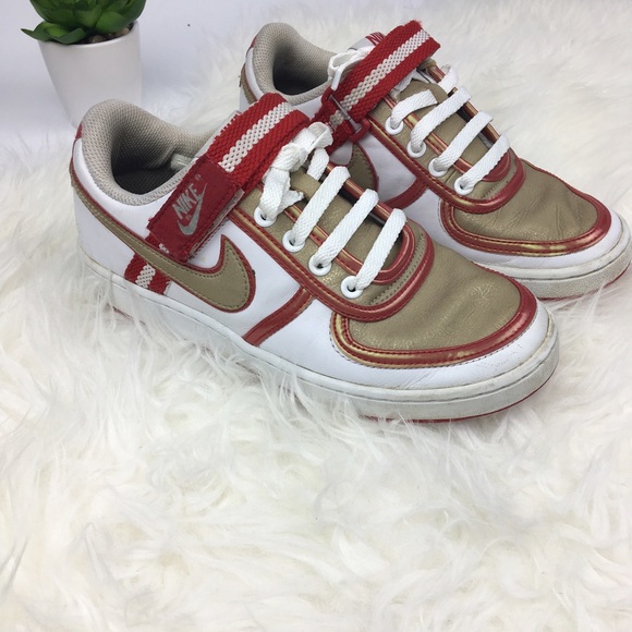 red and gold tennis shoes