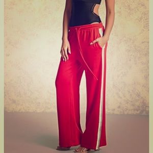 Medium red Nike athletic pants flared