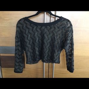 Dark, long sleeved crop top