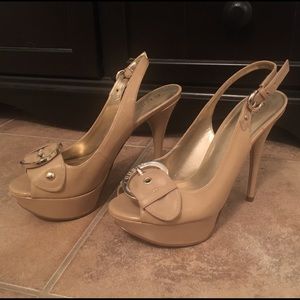 Nude Guess heels with gold buckle