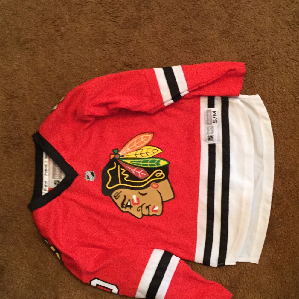 Youth size s/m sharp blackhawks jersey!!