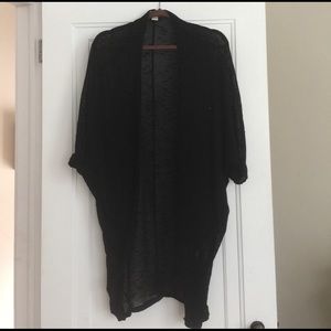 Black, light weight cover. Mudd