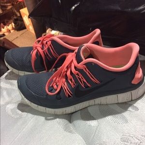 Gray and pink Nike shoes