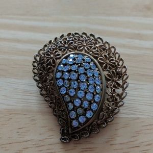 Vintage dainty filigree brooch with blue stones