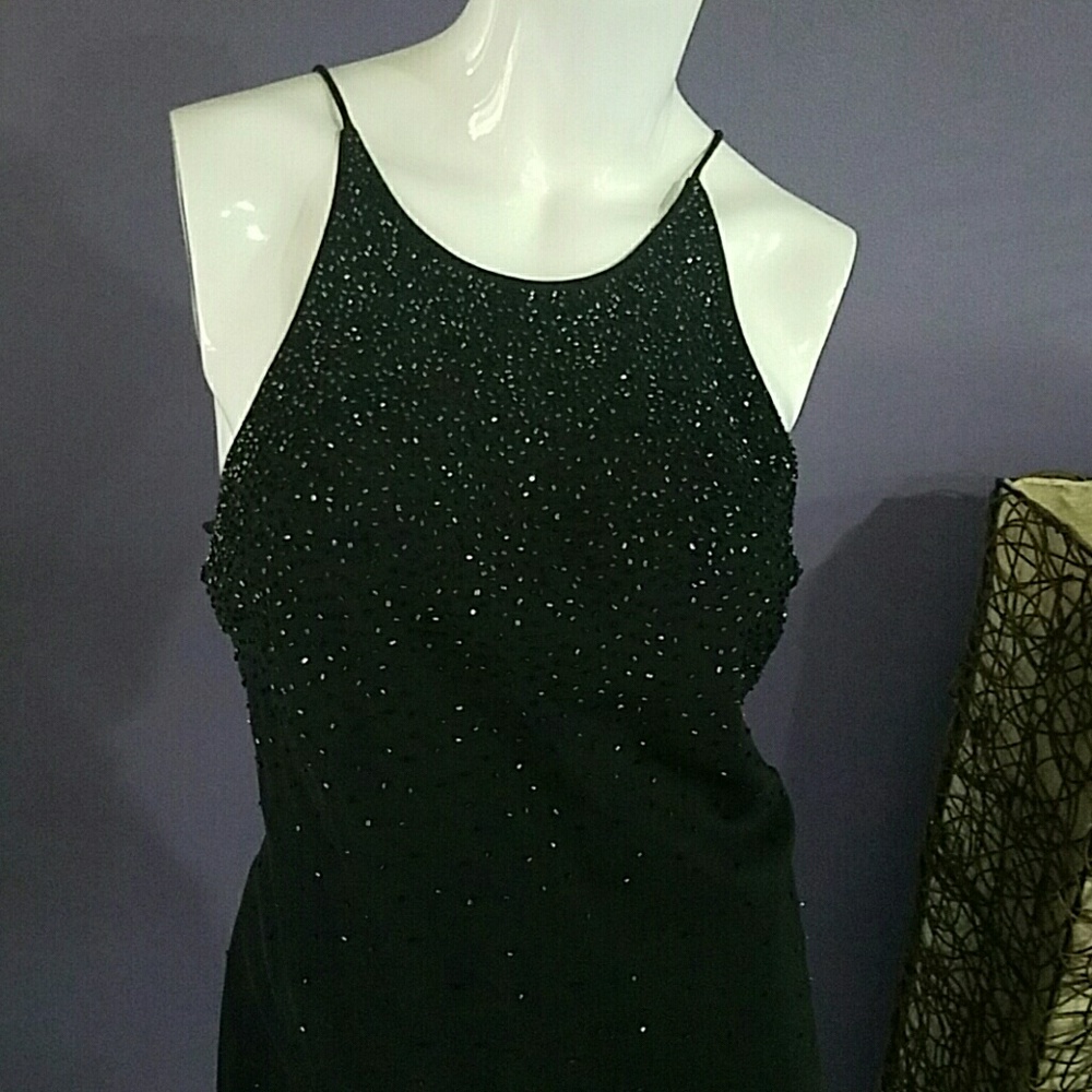 Beaded black dress.