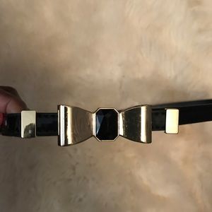 Black Patent Belt With Gold Bow