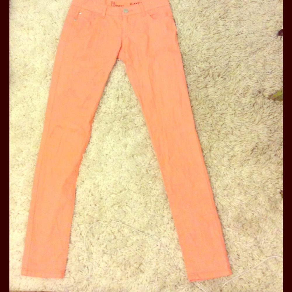 Peach colored skinny jeans