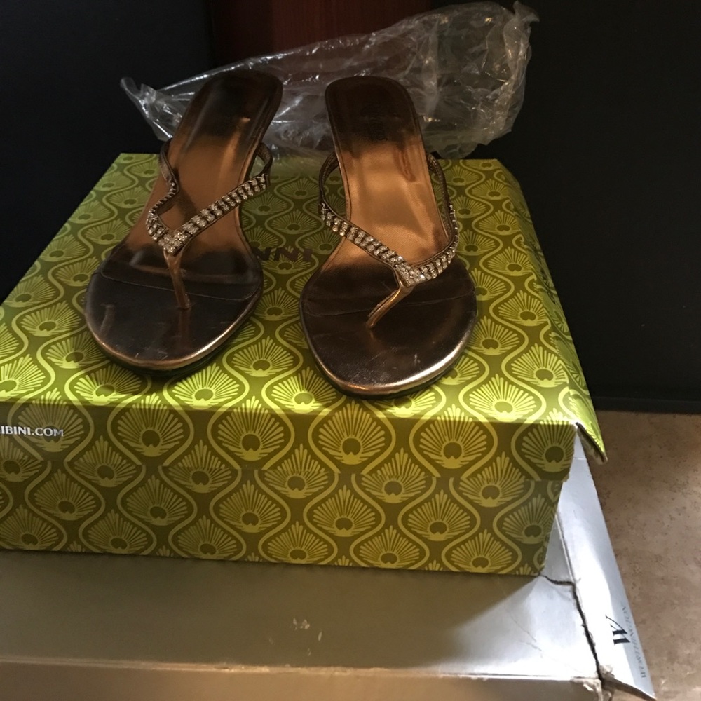 Dress slipper never worn still with plastic on btm