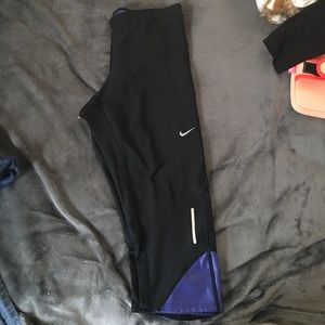 Purple and black Nike leggings