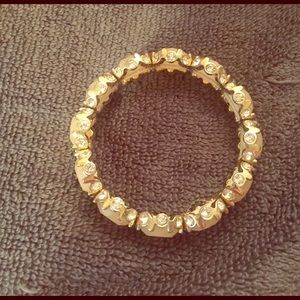 Francesca's jeweled bracelet.