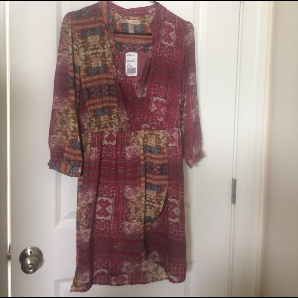 Aztec print, tulip hem, 3/4 sleeve V neck dress