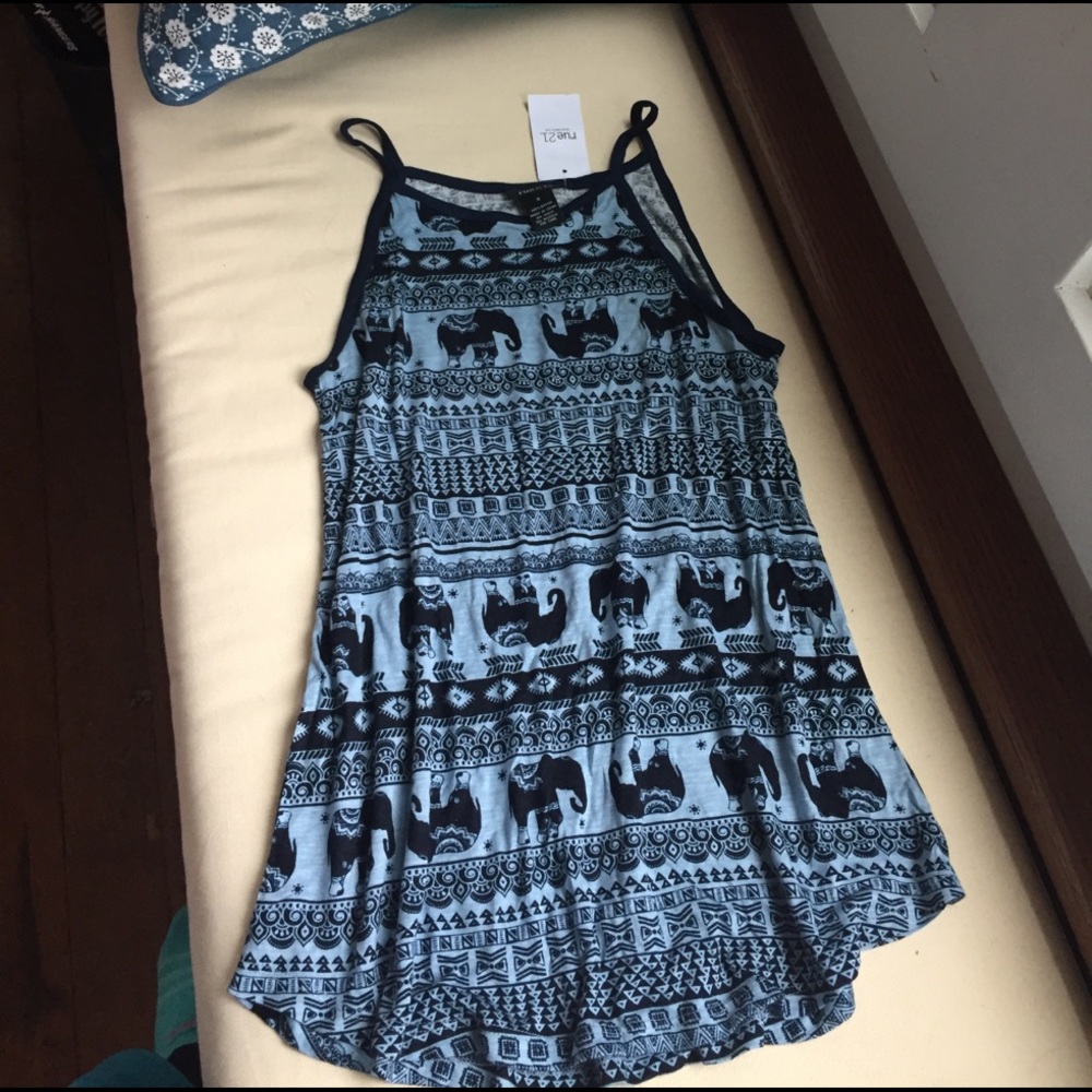 Loose blue fitting tank top with tribal print