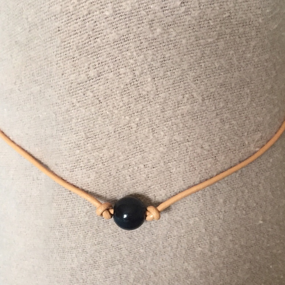 Tan leather with black pearl choker