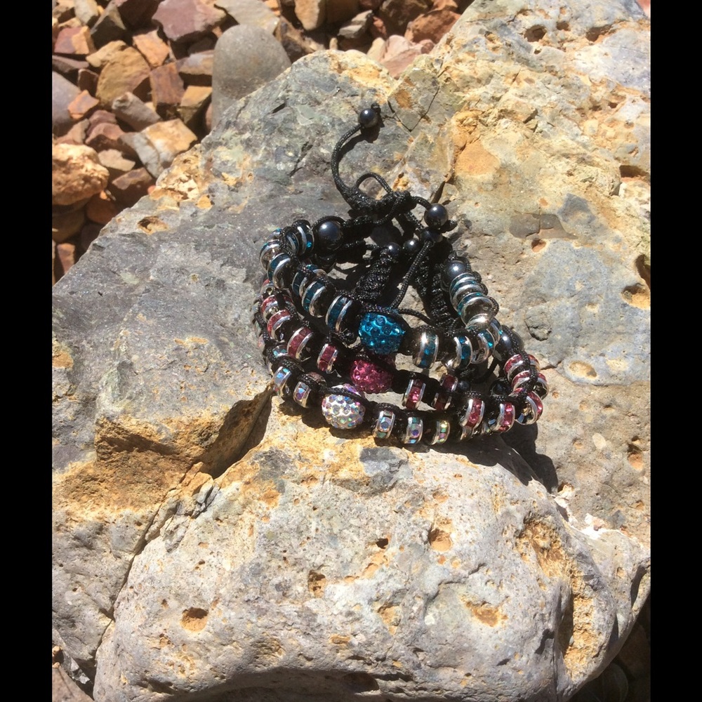 3 ( pink, blue, white ) adjustable bracelets